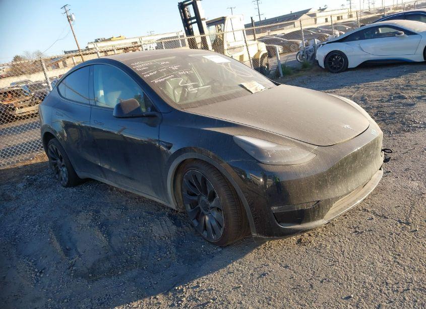 Main photo of 2022 TESLA MODEL Y PERFORMANCE DUAL MOTOR ALL-WHEEL DRIVE with VIN 7SAYGDEF7NF552240