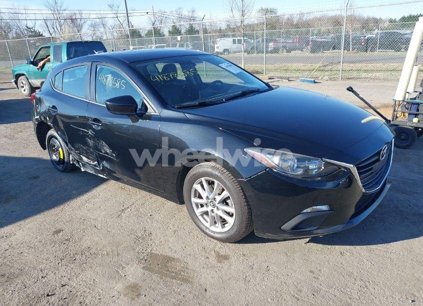 Main photo of 2014 MAZDA MAZDA3 I GRAND TOURING with VIN JM1BM1M70E1211906