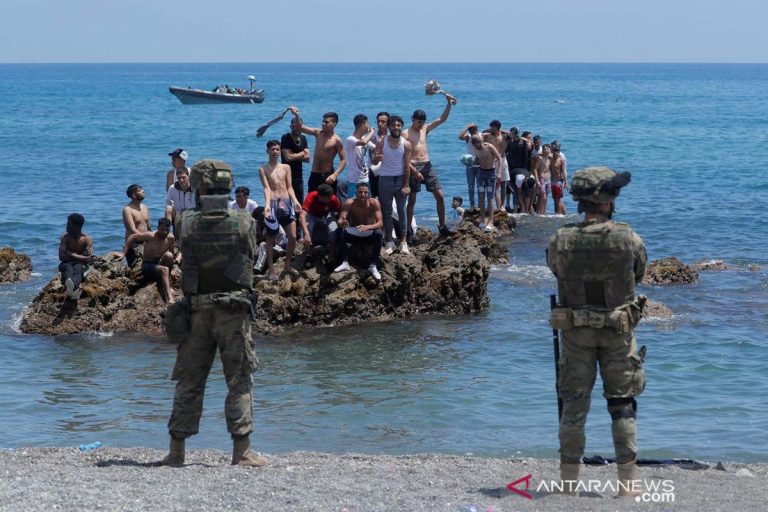 2021-05-18T135237Z_1223127297_RC2CIN9T8PUZ_RTRMADP_3_EUROPE-MIGRANTS