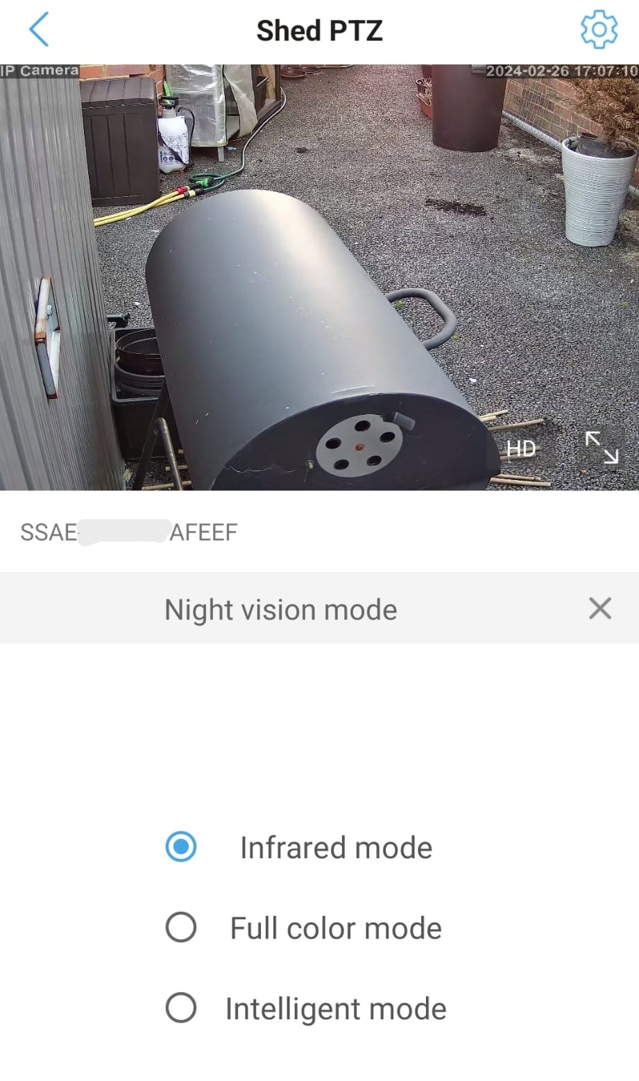 CamHi app camera settings screen with the mode button circled in yellow