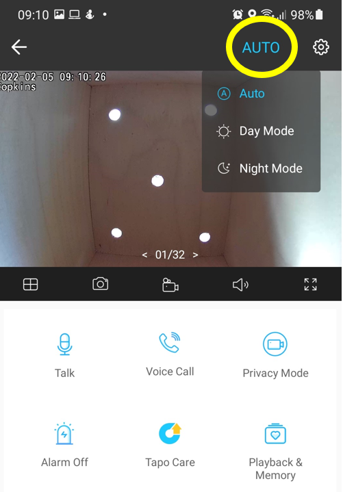 The Tapo app camera settings screen with the day/night mode button circled in yellow
